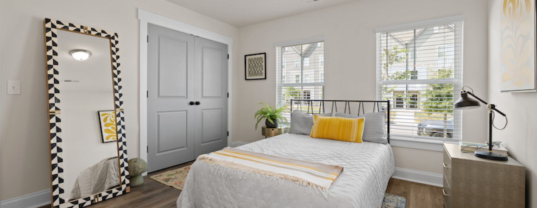 Modern bedroom in a South End townhome at Blu South in Pineville