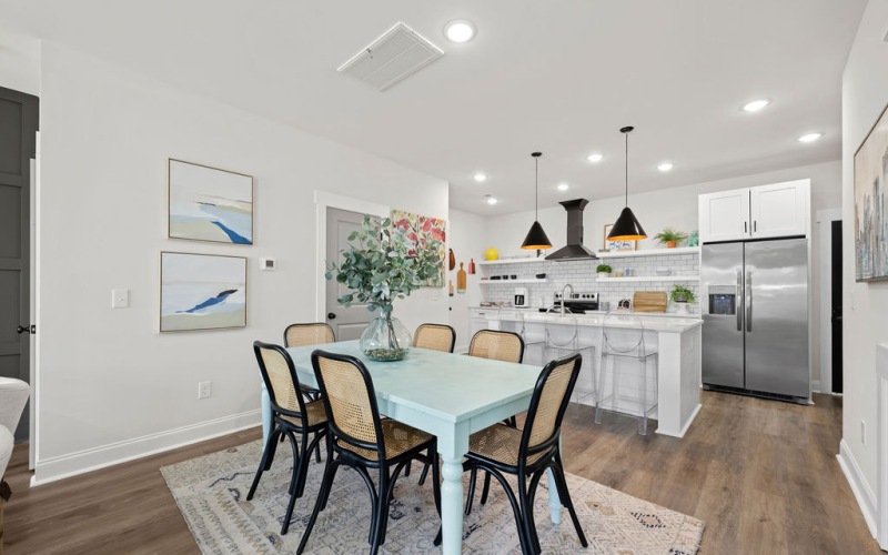 Upscale dining area and kitchen at Blu South luxury townhomes in Pineville